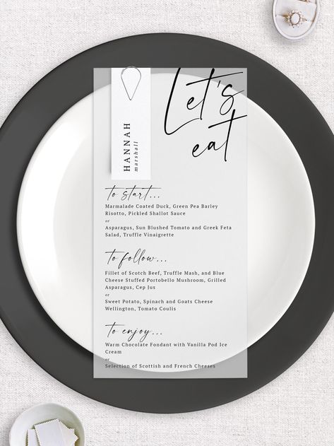 Wedding Menu and Name Card, Vellum menu with guest name attached, Black and White Wedding Menu, Table Decor, Personalised Wedding Menu Menu and name card, printed on 150gsm Transparent Paper. "Let's Eat" written at the top in a bold modern font, followed by your wedding breakfast menu. Personalised with your guests names and menu choices, with a choice of a gold or silver clip. HOW TO ORDER 1. Select your pricing category from the drop down menu. eg. if you need 50 menus, select "40-59" 2. Enter Menu With Guest Name, Menu And Name Card, Wedding Menu Table, Personalized Wedding Menu, Menu Table, Warm Chocolate, Wedding Vision, Breakfast Menu, Transparent Paper