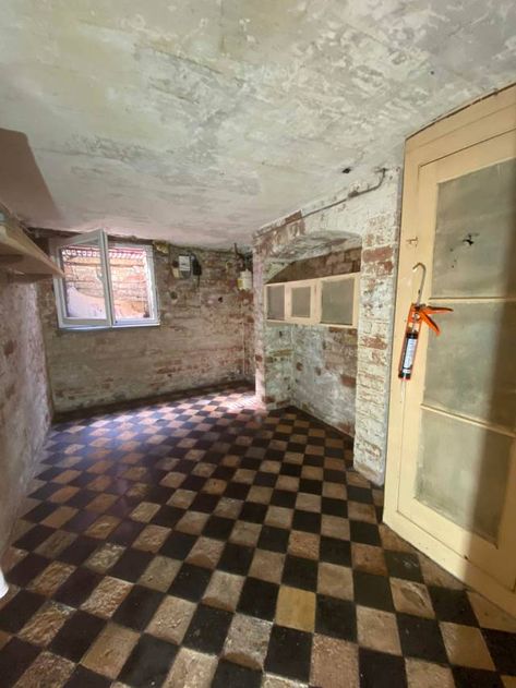 Take a look at our victorian cellar with its new underground window! | www.kezzabeth.co.uk | #victorianhouse #victoriancellar #cellar #victoriantiles #periodfloor #quarrytiles Victorian Basement, Basement Cellar, Victorian Terrace House, Quarry Tiles, Stripping Paint, Barn Style Doors, Victorian Tiles, House Games, Four Rooms