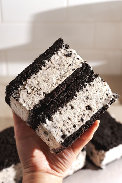 These homemade oreo ice cream sandwiches are easy to make and perfect to cool down with in the warmer months. They're made with a two ingredient oreo crust with a creamy no-churn oreo ice cream filling. #oreo #icecream #icecreamsandwich | teakandthyme.com Summer Party Food Ideas, Homemade Oreo Ice Cream, Summer Party Food, Icecream Sandwich, Oreo Ice Cream Sandwich, Ice Cream Sandwich Recipe, Condensed Milk Cookies, Ice Cream Sandwiches Recipe, Baked Dessert