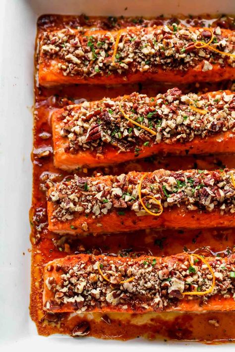 Orange-Maple Glazed Salmon with Crushed Pecans is a simple, yet impressive entree. Ready in under 30 minutes, it's a restaurant-worthy recipe rich in heart-healthy fats and antioxidants. #salmondinner #salmonrecipes #healthydinner Baked Salmon Filets, Dishing Out Health, Maple Salmon, Maple Glazed Salmon, Orange Salmon, Salmon Dinner, Salmon Dishes, Glazed Salmon, Maple Glaze