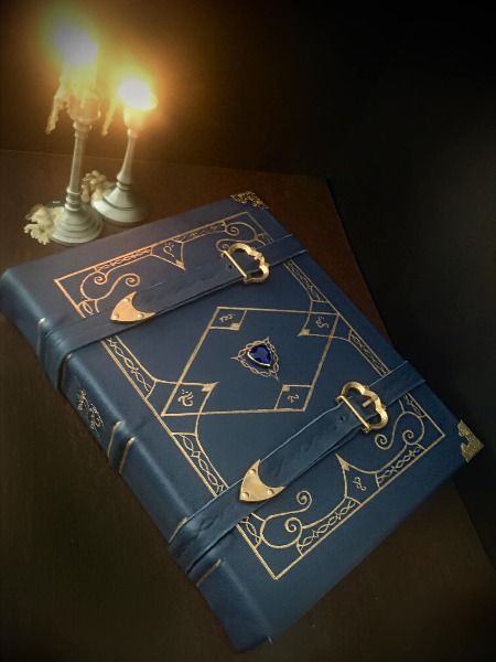 (@bywaterbookbindery on Instagram) Handmade traditional bookbinding D&D Dungeons and Dragons Elvish Wizard's spellbook calligraphy with spell descriptions 5E handwriting heavy leather grimoire Wizard Spellbook, Dnd Paladin, Dnd Wizard, Leather Book Covers, Magick Book, Witch Books, Magic Aesthetic, Cool Books, D&d Dungeons And Dragons