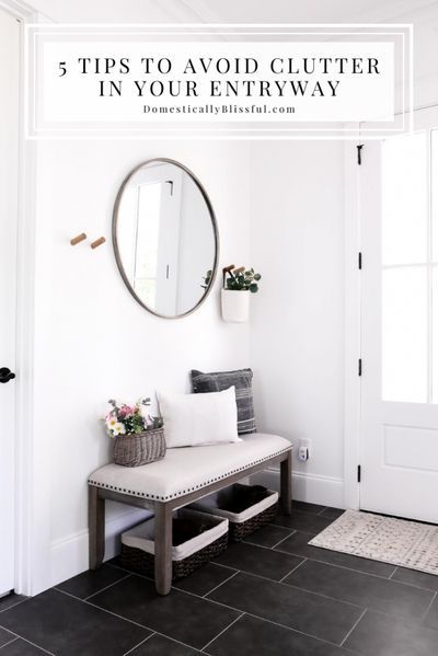 5 Tips to Avoid Clutter in Your Entryway so that your mudroom will stay organized and clean! | Cleaning tips for your mudroom. | How to keep your entryway clean and clutter-free. | Decluttering tips for your mudroom and entryway. | Mudroom reveal with tips to help keep your entryway clean. | Round mirror hanging between wood coat hooks. | Metal mail organizers hanging on a wall below a floating shelf. | An upholstered bench topped with pillows in an entry hallway. | Basket of faux flowers. Mudroom Baskets, White Mudroom, Home Decor Ideas Kitchen, Home Decor Apartment, Decor Ideas Kitchen, Home Decor Painting, Family Room Sofa, Entryway Mirror, Decor Videos