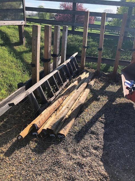 Pole storage using a $40 lumber organizer Small Horse Farm, Ladder Hooks, Landscape Timbers, Hose Hanger, Lumber Storage, Old Ladder, Wooden Brackets, Fence Boards, Ladder Rack