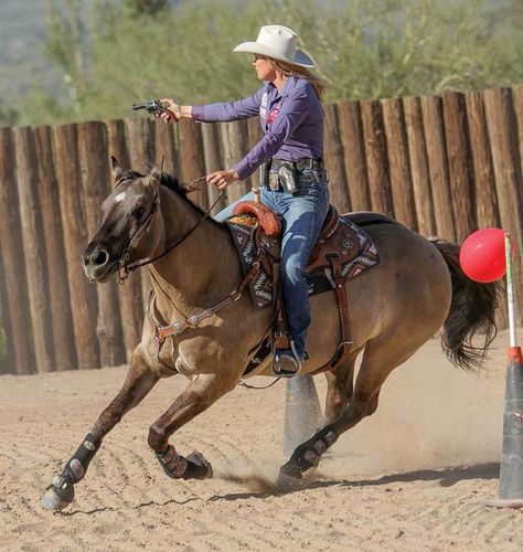 Mounted Shooting Rein Management. Mounted shooting rein management skills are required so you can cue correctly and get the proper response from your horse. Targets come fast, even at the beginner level, and gun handling requires quick thinking. This makes mastering rein management at home a key to competitive success. Kenda Lenseigne shares her best tips here. Western Horsemanship, Men's Equestrian, Mounted Shooting, Cowboy Action Shooting, Equestrian Helmet, Rodeo Horses, Western Riding, Horse Accessories, Equestrian Riding