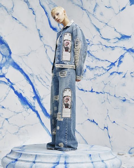 The Estate of Jean-Michel Basquiat has teamed up with @hm and the design duo Ev Bravado and Tela D’Amore, the creative minds behind @whodecideswar for a unique collection that celebrates the iconic American artist. Drawing on some of Basquiat’s lesser-known works, particularly those referencing music, the collection seamlessly integrates these elements into Bravado and D’Amore’s distinctive streetwear and distressed denim designs. Signature features like the stained-glass window motif are p... Ev Bravado, Michel Basquiat, Jean Michel Basquiat, Jean Michel, Artist Drawing, Denim Design, Stained Glass Windows, American Artists, Glass Window