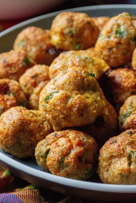 Keto Chicken Meatballs are your favorite ground chicken meatballs made with everyday ingredients but without the breadcrumbs.  Loaded with spices, parmesan cheese and fresh herbs, these Keto Chicken Meatballs are low-carb, gluten free and keto friendly but you would never even know it! | A Wicked Whisk #chickenmeatballs #ketochickenmeatballs #lowcarbchickenmeatballs #ketochickenmeatballslowcarb #ketochickenmeatballsbaked #ketochickenmeatballsglutenfree #lowcarbchickenmeatballshealthy Chicken Cheese Meatballs, Chicken And Cheese Meatballs, Low Carb Recipes With Ground Chicken, Low Carb Meals Ground Chicken, Bariatric Chicken Meatballs, Keto Recipes Using Ground Chicken, Keto Chicken Cheese Balls, Ground Chicken And Pork Meatballs, Low Sodium Chicken Meatballs