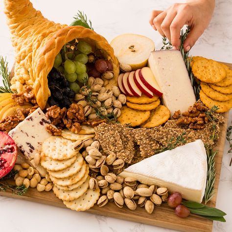 It’s called a horn of plenty for a reason. Cornucopia Charcuterie, Cornucopia Recipe, Thanksgiving Charcuterie Board, Thanksgiving Charcuterie, Entertaining Food, Thanksgiving Appetizer Recipes, Charcuterie Recipes, Thanksgiving Appetizers, Thanksgiving Menu