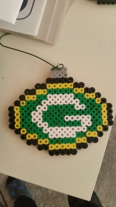 Green bay packers perler beads ornaments Perler Football, Perler Beads Ornaments, Beads Ornaments, Christmas Perler Beads, Melty Bead Patterns, Christmas Tree Diy, Perler Bead Templates, Diy Perler Bead Crafts, Perler Crafts