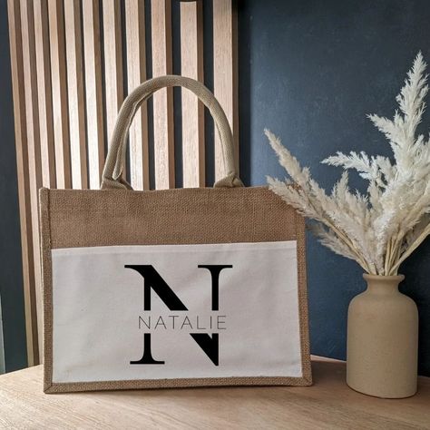 How would you use our jute bag? Perhaps a shopping trip to the markets? Carrying your laptop and notebook to a cafe meeting? Maybe to take with you as you laze by the pool on your next holiday and make sure you carry all the essentials like sunscreen, towel and a good book? Tell me below what you would use it for? #totebag #shoppingbag #personalisedgifts #personalisedbag #jutebag #beachbag #giftsforbridesmaids #giftsformum #giftsforher #travelbag #smallbusinesssupport #organisedmum #or... Jute Bags Design, Organised Mum, Bridal Party Accessories, Jute Tote Bag, Burlap Tote Bags, Burlap Tote, Jute Tote Bags, Jute Totes, Jute Bag