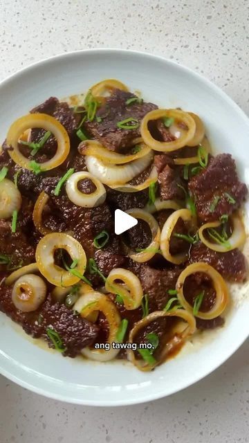 Asian Food | Recipes | Cooking on Instagram: "🐄 For bistek / beefsteak / Filipino beef and onions by @pepper.ph that won’t dislocate your jaw, reach for some baking soda and cornstarch.👌⁣ ⁣ Comment "BISTEK " to receive his complete recipe⁣ 📌Save/share for your weekly meal rotation‼️⁣ ⁣ Velveting, a technique often found in Chinese cooking, tenderizes tough cuts like beef sirloin with a 30 min marinade. The result: soft, tender beef!⁣ ⁣ Baking soda helps weaken the sirloin’s protein bonds; cornstarch helps the beef retain moisture when seared.⁣ ⁣ Try our bistek Tagalog marinade, no more leathery sirloin!⁣ * 250–300g beef sirloin⁣ * ½–1 T soy sauce⁣ * 1 T canola oil⁣ * 1 T cornstarch⁣ * ½ T calamansi juice⁣ * ½ t baking soda" Beef Sirloin Recipes, Bistek Tagalog, Beef And Onions, Sirloin Recipes, Calamansi Juice, Meal Rotation, Beef Sirloin, Tender Beef, Filipino Food