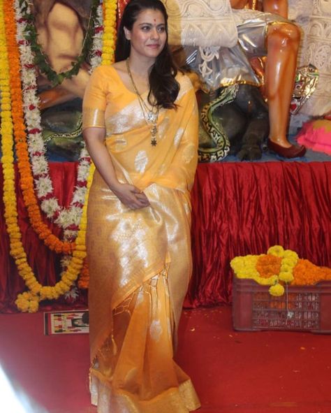 kajol in a yellow silk saree at durga puja pandal0 Durga Puja Pandal, Yellow Silk Saree, Kajol Saree, Puja Pandal, Side Braid Hairstyles, Braided Hairdo, Latest Designer Sarees, Yellow Saree, Yellow Silk