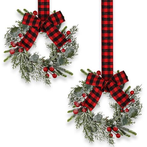 PRICES MAY VARY. Small Wreath Set: the package includes 2 pieces of Christmas cabinet wreaths, each cabinet wreath comes with a faux burlap red and black buffalo plaid bow, meeting your decorating needs in various places Proper Size for Cabinet: each farmhouse wreath comes with a size of approx. 23 cm/ 9 inches in outside diameter and approx. 12 cm/ 4.7 inches in inside diameter, just the appropriate size to decorate your cabinets and shelves, without taking up too much space Long Lasting and Se Outside Wreaths Christmas, Christmas Indoor Window Decorations, Christmas Outside Window Decorations, Brown Cabinet Christmas Decor, Christmas Chair Wreaths, Cozy Farmhouse Christmas Decor, Christmas Fence Decorating Ideas, Stair Rail Christmas Decor, Small Wreaths On Cabinets