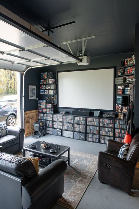 Man Cave Ideas in garage Living Room With Garage Door, Garage To Hang Out Room, Black Man Cave Ideas, Garage Entertainment Room, Turn Garage Into Man Cave, Man Space Ideas, Single Garage Conversion Ideas Uk, Garage Design Man Cave, Garage Turned Into Family Room