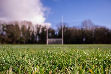 Grass on a pitch in focus, Irish national sport goalpost out of focus in the background. Concept football, rugby, hurling and camogie training. Rugby Pitch, Out Of Focus, In Focus, Dream Life, Rugby, Football, Train, Quick Saves, American Football