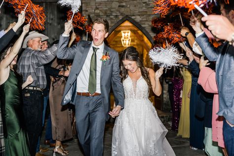 We exited with blue and orange Auburn shakers / pompoms. Such a great wedding exit idea instead of sparklers. #weddingideas Auburn Wedding, Wedding Exit, Wedding Exits, Blue And Orange, Wedding Bells, Auburn, Wedding Inspo, Victorian Dress, Pom Pom