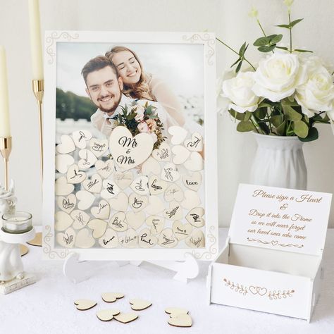 PRICES MAY VARY. Alternative Guest Book Wedding: You will get 1 drop frame guest book (15.7" x 11.8" x 0.67"), 1 wooden frame stand, 1 plywood box (6.3" x 4.9" x 2.7"), 1 large wooden heart (3"), 70 pieces small wooden hearts (1.4"), 1 Installation Instructions. It is a great idea to use instead of a traditional guest book, to create an unforgettable wedding reception. Keep Your Wonderful Moments: We provide a plywood box to place blank wood hearts, your guests leave their names or wishes on the Wedding Books, Reception Gifts, Drop Box Guest Book, Bridal Shower Guest Book, Wedding Memory Box, Wooden Guest Book, Wedding Frame, Personalized Wedding Guest Book, Wedding Guest Book Alternative