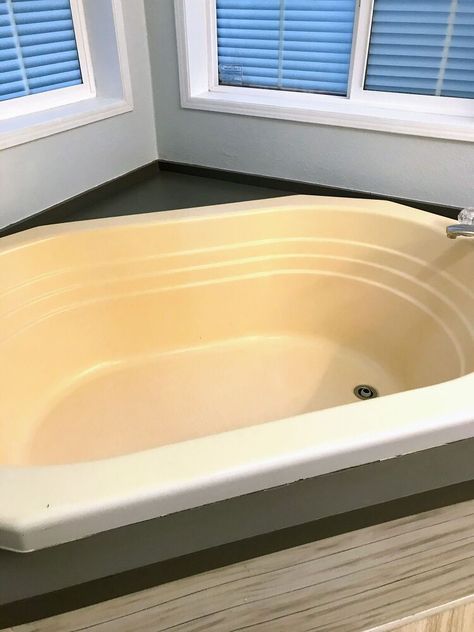 Hello there. If you have a fiberglass bathtub that has yellowed, this may help you decide on what to do with it.Here is a brief post on how I updated our manufactured home's garden style fiberglass bathtub with paint. I go into more details over at K's Olympic Nest (link below) so hopefully you will check that out as well. Our garden tub happens to sit below two windows. Over time it yellowed and no matter what I tried, I couldn't bring it back to it's once upon a time shining white.… Epoxy Spray Paint, Nuvo Cabinet Paint, Garden Bathtub, Tub Enclosures, Wall Paneling Diy, Acrylic Tub, House Blinds, Plastic Trim, Tub Surround