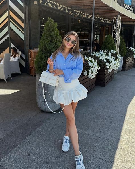 Loving this fresh and stylish look from @kraavchuk! 💙✨ The combo of the blue blouse with the ruffled white skirt is perfect for a chic day out. What do you think of this outfit? 🌸 blue blouse style, white ruffle skirt, casual chic, summer fashion, stylish outfit, trendy day look, street style, fashion inspiration, cute summer outfit, city style #blueblouse #ruffleskirt #summerfashion #streetstyle #fashioninspiration #outfitideas #chiclook #trendyoutfits #citystyle #casualchic White Ruffle Skirt, Balloon Skirt, Office Outfits Women, Party Skirt, Zara Skirts, Spring Outfits Women, Cute Fall Outfits, White Skirt, Casual Summer Outfit