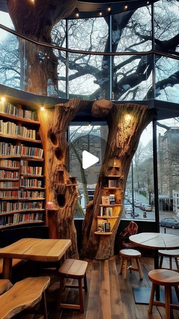 82K views · 37K likes | Reader's ☁️ 9 on Instagram: "If you go through the tree, there’s a secret cat cafe 😁 What do you think? Wouldn’t this be the coolest bookstore / bookshop cafe? ☕️🐈‍⬛  . I had this idea for a long time, so I just rendered and animated it using Midjourney and animation tools.  . This said, thank you for all the love! Your support means the world to me and it enables me to continue spreading joy and creativity. . Happy Reading! . #bookstagram #bookshop #midjourney #library" Best Bookstores In The World, Cute Book Store, Cottagecore Bookstore, Moody Bookstore, Book Cafe Ideas, Book Store Design, Book Coffee Shop, Dream Bookstore, Coffee Shop Bookstore