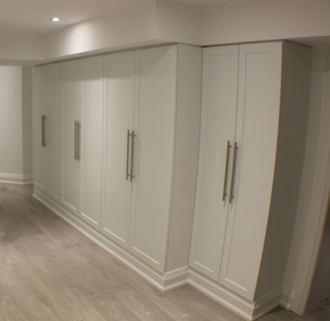 Toronto Basement Storage Basement Storage Closet, Basement Storage Cabinets, Storage Room Shelves, Kitchen Wall Storage Cabinets, Basement Storage Organization, Basement Built Ins, Basement Shelving, Basement Closet, Contemporary Basement