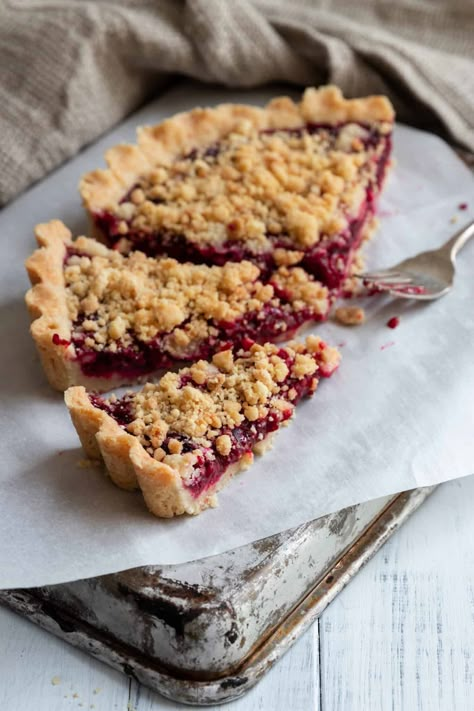 I am super excited about this Spectacular Vegan Raspberry Crumble Tart recipe. The tartness of the raspberries, the slight sweetness of the maple syrup, and the delicious pastry make this a culinary experience. #vegan #easy #raspberrytart #vegantart #plantbased Vegan Raspberry Tart, Crumble Tart, Vegan Tarts, Raspberry Jam Recipe, Raspberry Crumble, Jam Recipes Homemade, Raspberry Pie, Cranberry Almond, Raspberry Almond