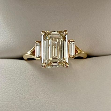 Emerald cut engagement ring