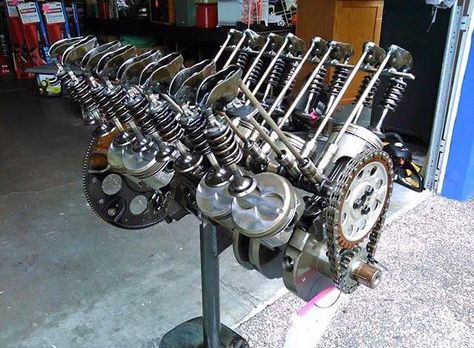 all the moving internal pieces of a v8 internal combustion engine Engine Table, Garage Photos, Car Part Art, Car Parts Decor, Car Part Furniture, Automotive Furniture, Car Furniture, Welding Art Projects, Automotive Decor