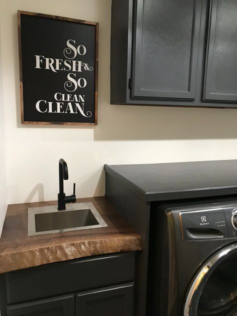 DIY laundry room update. Fresh paint, dark walnut natural edge sink counter, washer & dryer enclosure and pet dog bowl station. Counter On Top Of Washer And Dryer, Black Washer And Dryer Laundry Room, Washer Dryer Enclosure, Black Washer And Dryer, Dog Bowl Station, Farmhouse Laundry Room Ideas, Remodeling Basement, Diy Laundry Room, Sink Counter