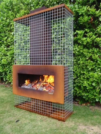 Outdoor fireplace (Gabion) Grill Fireplace, Bloxburg Basement, Fireplace Pictures, Cave Basement, Metal Fireplace, Bar Basement, Patio Fireplace, Pergola Design, Fire Pit Designs