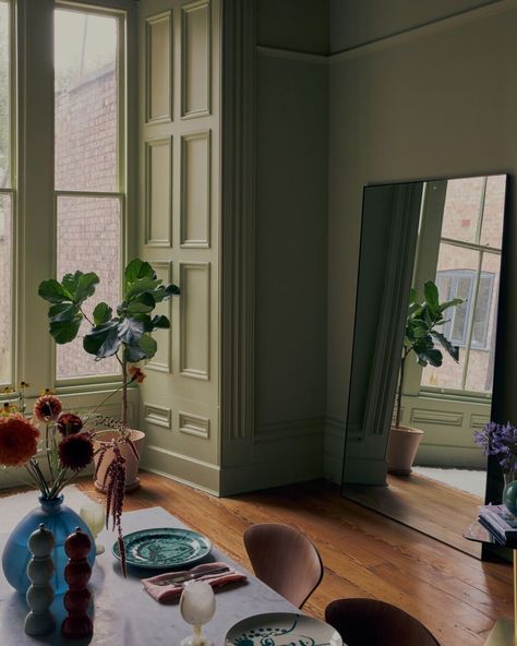 We love the nod to the double drenching trend in Stacey Dooley's (@sjdooley) elegant green dining room. The dark olive green on the ceiling adds drama and architectural interest, perfectly complementing the paler olive shade on the walls. Part of Stacey’s new collab with @coatpaints, these glorious green shades have been named after Stacey’s partner, former Strictly dancer Kevin Clifton, and their daughter Minnie. 💚 Link in bio to see more... #housebeautifuluk #homedecoration #colourfulh... Double Drenching, Kevin Clifton, Olive Green Interior, Bright Olive Green, Strictly Dancers, Light Green Walls, Green Dining Room, Green Shades, Dark Olive Green