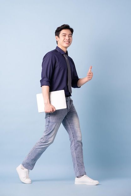 Full length image of young asian busines... | Premium Photo #Freepik #photo #chinese-man #buisness-man #business-man #asian-businessman Asian Business Man, Modelling Reference, Teacher Reference, Jumping Poses, Vietnamese Men, Lycra Shorts, International Flight, Teacher Photo, Office People