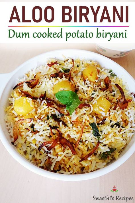 Aloo Biryani is a delicious dum cooked layered biryani made with basmati rice, spices, herbs, yogurt and baby potatoes. #indian #rice via @swasthi Aloo Biryani, Rice Biryani, Aloo Dum, Vegetarian Biryani, Rice Spices, Hyderabadi Biryani, Pakistani Dishes, Indian Rice Recipes, Indian Rice