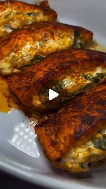 Bake Cook Eat Enjoy on Instagram: "Repost @seafood_network 🎥 chazscuisines  Follow @seafood_network 🎥chazscuisines for more delicious recipes!  Seared Cajun Stuffed Salmon topped with a light creamy sauce✨   Ingredients:  4 salmon fillets 2 Tbsp olive oil  2 Tbsp Creole seasoning  2 Tsp onion powder 1 Tsp garlic powder 1 Tsp Sazón seasoning  1 Tsp chili powder  Salt and pepper to taste   Filling:    8 Oz cream cheese, softened  2 cups spinach, steamed 1/2 cup, mozzarella cheese 1/2 lemon, squeezed  1 Tsp creole seasoning  1 Tsp onion powder  1 Tsp garlic powder  Salt and pepper to taste  #seafood #salmon #fish #lowcarb #lowcarbrecipes #ketorecipes #keto #shrimprecipes #healthyrecipes #healthyfoodshare #goodmoodfood #pescatarian #madefromscratch #homemade  #delicious #viralvideo #cleaneat Salmon Shrimp Recipes, Stuffed Salmon Recipes Spinach, Cajun Stuffed Salmon, Stuffed Salmon Recipes, Stuffed Salmon, Salmon Fish, Creole Seasoning, Salmon Fillets, 30 Minute Meals