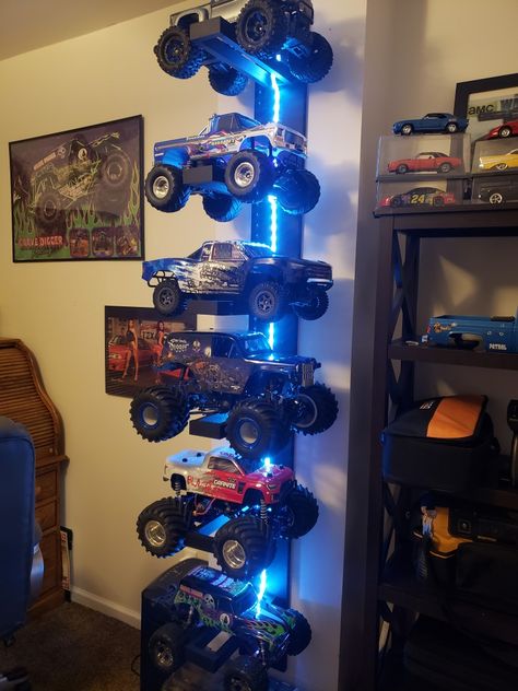 Big Truck Storage Kids Rooms, Rc Car Storage Ideas Diy, Monster Jam Boys Bedroom, Monster Jam Kids Room, Monster Truck Toy Storage, Rc Storage Ideas, Boy Room Storage Ideas, Rc Truck Storage Ideas, Monster Truck Bedroom Ideas Boy Rooms