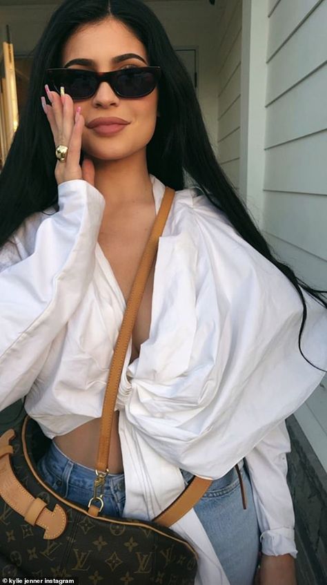 Kylie Jenner poses in a casual white shirt and denim jeans... after wowing at the Met Gala | Daily Mail Online Stylizacje Kylie Jenner, Kendall Ve Kylie, Stile Kylie Jenner, Casual White Shirt, Look Kylie Jenner, Estilo Kardashian, Looks Kylie Jenner, Trajes Kylie Jenner, Estilo Kylie Jenner