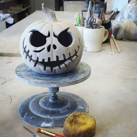 In preparation for Halloween workshops coming up @theclayspace later this month, I tested out my clay pumpkin carving skills on this spooky little jack-o'-lantern today.  I'm pretty stoked with how it came out 😁. #greenwoodpottery #theclayspace #canadianceramics #pottery #sculpture #claysculpture #jackolantern #jackskellington #timburton #pumpkincarving #skillsthatpaythebills #bestjobever Pottery Jack O Lantern, Ceramic Art Halloween, Halloween Sculptures Clay, Ceramic Jack O Lantern, School Clay Projects, Clay Jack O Lantern, Crock A Doodle, Pottery Halloween, Pumpkin Pottery