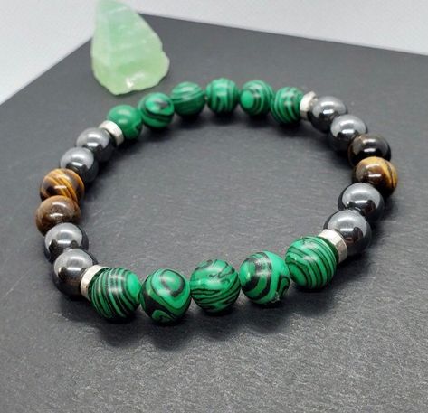 Excited to share this item from my #etsy shop: Genuine Green Malachite, Tiger’s Eye and Hematite Unisex Bracelet Malachite Bracelet Ideas, Crystal Combos, Shambala Bracelet, Beautiful Beaded Bracelet, Malachite Bracelet, Tiger Eye Jewelry, Green Malachite, Chakra Jewelry, Gemstone Beaded Bracelets