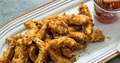 Chicken Tenders with Spicy Honey Recipe - Magnolia Magnolia Recipe, Batter For Chicken Tenders, Magnolia Table Recipes, Joanna Gaines Recipes, Magnolia Network, Magnolia Kitchen, Fried Chicken Tenders, Magnolia Table, Chicken Tender Recipes