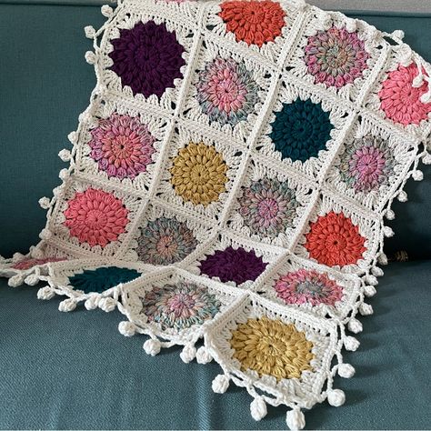 This Beautifully Soft Handmade Blanket In A Colorful Boho Style Will Be A Sweet Gift To Yourself Or That Little Bundle Of Joy! Crocheted Using Soft Yarn In Colorful Tones - Sunburst Granny Square Style & Adorned With A Fun Pom Pom Border - This Blanket Is Sure To Bring A Smile! Handmade Upon Ordering. Size Apx 30” X 21” Created In A Smoke/Pet Free Home. Tags- Baby Shower Gift, Boutique Blanket, Boho Home Blanket, Couch Decor, Boho Nursery Decor Lap Blanket Crochet, Crochet Granny Square Baby Blanket, Blanket Borders, Colorful Boho Style, Unique Crochet Blanket, Granny Square Baby Blanket, Sunburst Granny Square, Boho Crochet Patterns, Blanket Couch