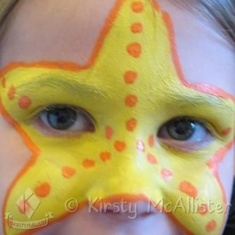 Starfish face paint Under The Sea Face Painting Easy, Sea Creatures Face Painting, Starfish Face Paint, Under The Sea Face Painting, Under The Sea Face Paint, Sea Face Paint, Beach Face Paint, Ocean Face Paint, Fish Face Paint