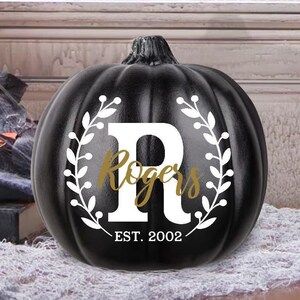 Personalized faux black colored pumpkin can be used indoors or out and reused year after year! Trendy black colored pumpkin with gold and white vinyl lettering will match perfectly with your fall or fall farmhouse decor! Pumpkin includes a vinyl name and initial as well as a date if you choose.

#fallpumpkin #monogrampumpkin #farmhousepumpkin #trendyfall #beigefall #beigehalloween #trendyhalloween #porchpumpkin #frontporchdecor #pumpkinwithname #familypumpkin #fallphotoshoot #blackpumpkin Fall Decor Wedding, Personalized Pumpkins, Monogram Pumpkin, Fall Farmhouse Decor, Gold Pumpkin, Pumpkin Monogram, Porch Pumpkins, Gold Pumpkins, Black Pumpkin