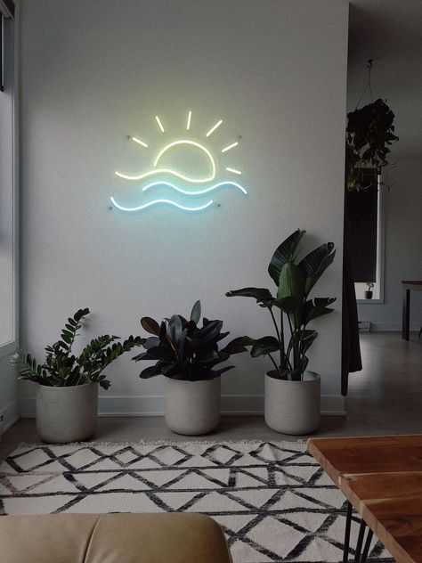 Sunsets amidst ocean waves hits a different sense of peace. This LED neon sign celebrates perfect summer sunsets and hangs perfectly in the bedroom of your beach vacation home or AirBnB rental. All signs are handmade in our studio. Each piece is unique and created after your order is placed. This allows us to make extra customizations to your sign to ensure the design is tailored to you. Due to the manufacturing process, designs might slightly vary from the picture. Slight marks from the tubing Aesthetic Pictures Room Decor, Surf Neon Sign, Neon Wave Sign, Wave Led Light, Neon Signs Bedroom Decor Ideas, Beachy Neon Sign, Neon Signs For Home, Sun Neon Sign, Wave Neon Sign