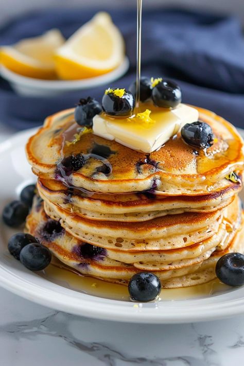 These lemon blueberry pancakes are light, fluffy, and irresistible! Treat your family to a fancy breakfast they'll jump out of bed for. Pancake Recipe Aesthetic, Soul Food Breakfast, Pretty Pancakes, Light Breakfast Ideas, Fancy Pancakes, Winter Breakfast Recipes, Dessert Pancakes, Couple Template, Maple Cocktail