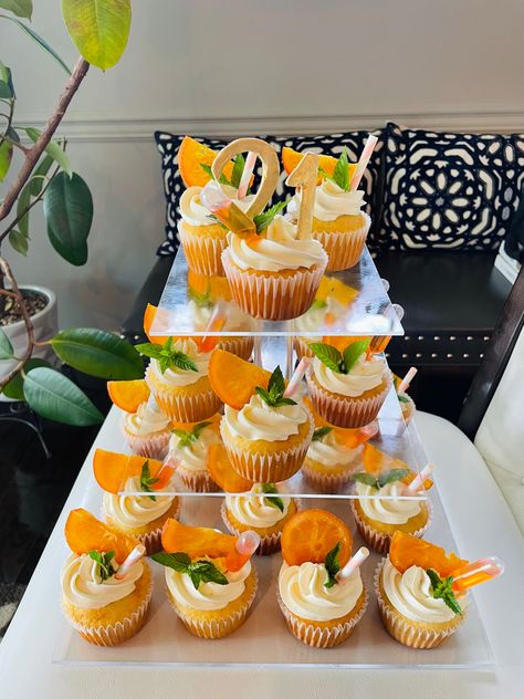 Cupcakes With Orange Slices, Citrus Decorated Cupcakes, Citrus Bridal Shower Desserts, 21st Birthday Orange Theme, Oranges Themed Party, Citrus Dessert Table, Orange Theme Cupcakes, Aperol Spritz Cupcakes, Citrus Themed Cupcakes