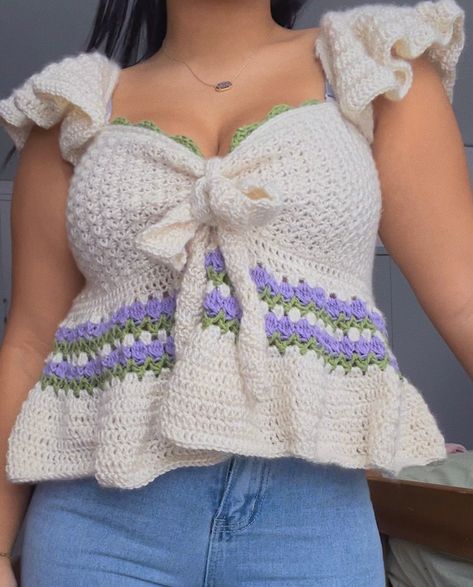 Hi! This is the pattern for my first original crochet design, the Tulip Top! This pattern is made to measure and can fit all sizes! IF you have any questions about this top, feel free to reach out to me on Instagram and TikTok @crochetjuless. Skill level: Advanced Beginner Terminology: US This purchase includes only a PDS file with a written pattern for the Tulip Top, NOT the physical piece.  Terms of Use: This pattern is strictly for personal uses only. The redistribution of this pattern in the form of PDF or video tutorial is strictly prohibited regardless of whether it is free or for sale. Crochet Top Ruffle, Trendy Crochet Tops, Crochet Babydoll Top, Tulip Top, Crochet Festival Top, Crochet Pour Halloween, Beau Crochet, Crochet Festival, Unique Tools