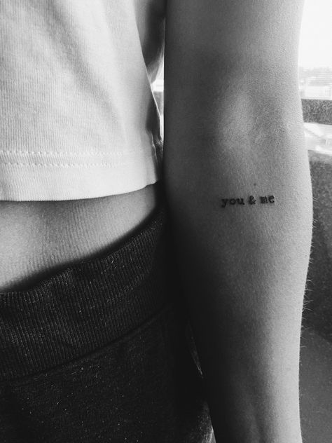 “You and me” small inner arm tattoo You And Me Tattoo, Inner Arm Text Tattoo, Lower Bicep Tattoo Women, Word Arm Tattoo, Inner Bicep Script Tattoo, Word Tattoo Inner Arm, Inside Arm Quote Tattoo, Quote Inner Arm Tattoo, Word Tattoo Placements