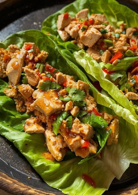 "Delicious and easy Thai chicken lettuce wraps recipe perfect for a light and flavorful meal! Try it today! #thai #chicken #lettucewraps #recipe #delicious" Pf Chang Lettuce Wraps, Easy Thai Chicken, Thai Lettuce Wraps, Thai Chicken Lettuce Wraps, Lettuce Wraps Recipe, Chicken Lettuce Wraps Recipe, Lettuce Wrap Recipes, Asian Street Food, Delicious Thanksgiving