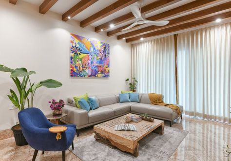 A Home Interior Replete With Colour And Materiality | Beyond Spaces Design Studio - The Architects Diary Rafters Ceiling Living Rooms, Balcony Nook, Rafter Ceiling, Wooden Centre Table, Wooden Rafters, Hyderabad City, Comfortable Sectional Sofa, False Ceiling Bedroom, Ceiling Design Living Room