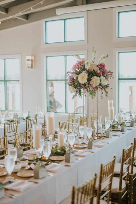 Tall pink and white floral centerpiece perfect for our wedding venue at Boatwerks Waterfront Restaurant located in Holland, MI. 📷Kate Touzel Photography #elegant #modern #wedding #reception #ceremony #ideas #decorations #gettingmarried #setup #bride #groom #michigan #westmichigan #modernwedding #largewedding #centerpiece #decor #tablesetup #summer #spring #waterfront #lakefront #venue #bridalparty #2020wedding #trendy #weddingtrends #space #weddingvenue #hollandmichigan White Floral Centerpieces, Modern Wedding Reception, Reception Ceremony, Elegant Modern Wedding, Holland Michigan, Red Water, Waterfront Restaurant, Floral Centerpiece, Table Inspiration