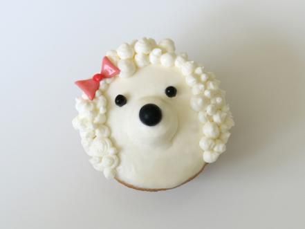 How to Make Adorable Dog Cupcakes : Food Network | Everyday Celebrations: Recipes for Easy Entertaining | Food Network Poodle Cake, Dog Cupcake Design, Dog Birthday Cupcake Recipe, Dog Decorated Cupcakes, Dog Design Cupcakes, Cupcake Dog Design, Puppy Dog Cupcakes, Black Licorice Candy, Puppy Birthday Cakes